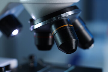 One microscope on blurred background, closeup view