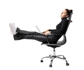 A woman reclining casually in a chair with a laptop on her lap, on a white background, conveying a...