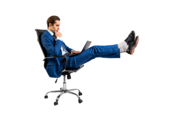 A man in a blue suit reclining in an office chair using a laptop, isolated on a white background, depicting remote work concept