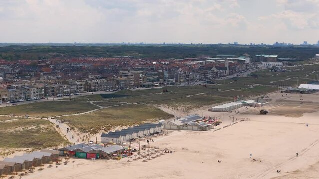 Aerial drone video of the coast and beach in the town named Katwijk, the Netherlands.