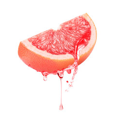 Fresh grapefruit with dripping juice on white background