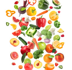 Different fresh fruits and vegetables in air on white background