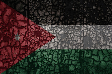 flag of jordan on a old grunge metal rusty cracked wall background