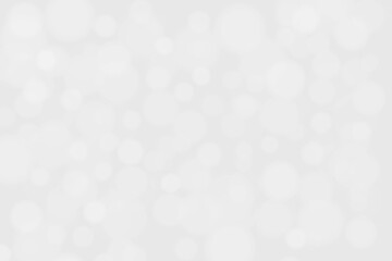 White and gray bokeh background. Photo can be used for the concepts of New Year, Christmas, Wedding Anniversary and all celebrations.	