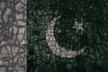 flag of pakistan on a old grunge metal rusty cracked wall background