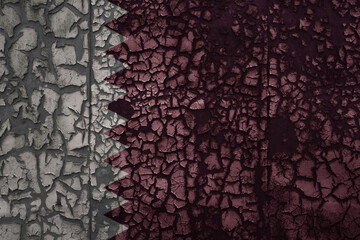 flag of qatar on a old grunge metal rusty cracked wall background