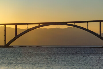 krk, croatia, 30 april, 2024, bridge Krčki most between island and croatian mainland in the evening light