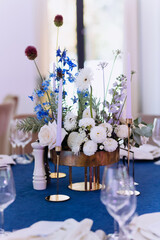 Beautiful decorated table set for wedding party. Wedding decorations with flowers. wedding decor