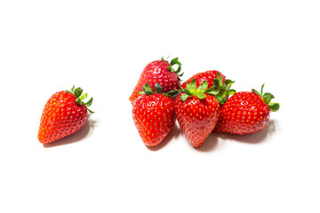 Red ripe strawberry background, close-up, front view, top view, strawberry plate with white background,