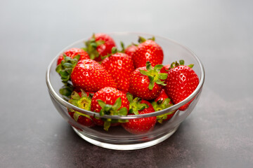 Red ripe strawberry background, close-up, front view, top view, strawberry plate with white background,