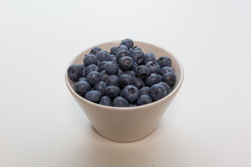 Blueberries isolated on white background, close-up, front view, top view,