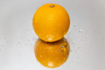 fresh orange isolated on white background, close-up, front view, top view,