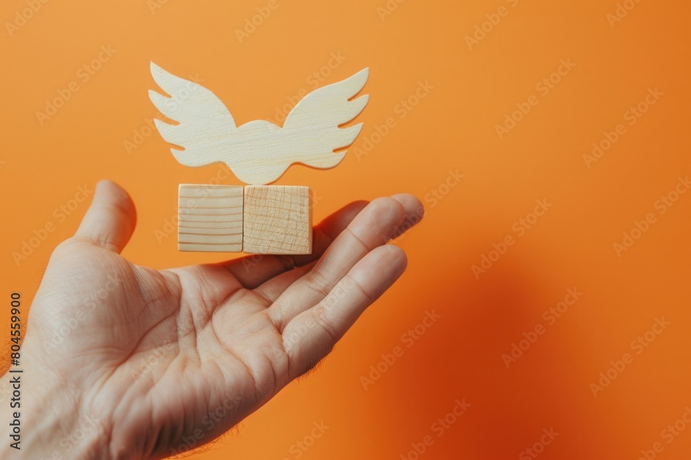 Poster a person holding a wooden toy with a dove on it. suitable for various concepts and designs