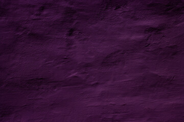 Purple colored abstract wall background with textures of different shades of purple