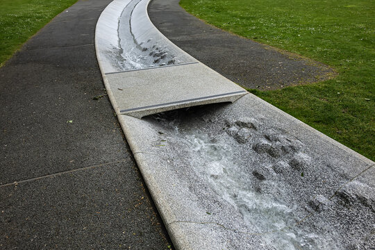 Diana Memorial Fountain is located south of the Serpentine Lake (designed by Gustafson Porte, 2004). London, UK. April 19, 2024.