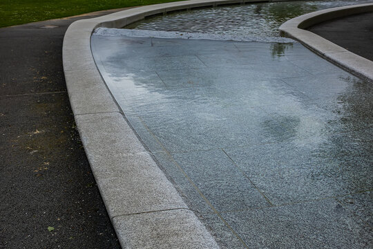 Diana Memorial Fountain is located south of the Serpentine Lake (designed by Gustafson Porte, 2004). London, UK. April 19, 2024.