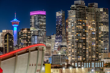 Calgary Tower and some of the modern skyscrapers in downtown Calgary at night