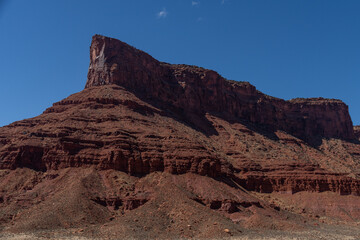 Red cliff and butte landscapes in Utah Castle Valley with blue skies in spring 