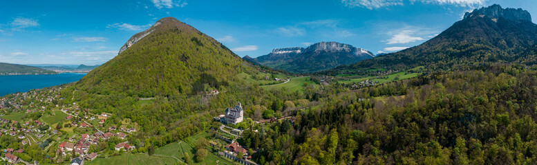 Aerial view of the Chateau de Menthon is a medieval castle located in the commune of...