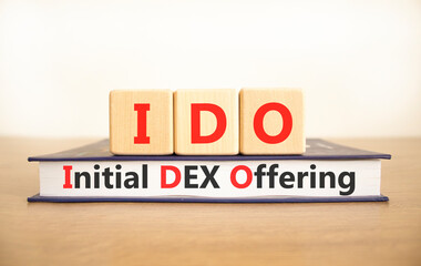 IDO initial DEX offering symbol. Concept words IDO initial DEX offering on beautiful wooden blocks...