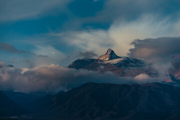 Mountains top and clouds at twilight dramatic landscape