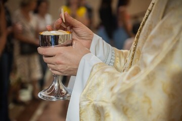 The holy host in the Eucharistic celebration in the Catholic Church.