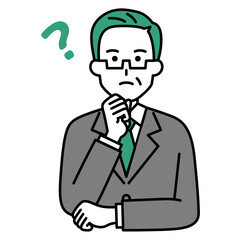 考える年配のスーツの男性