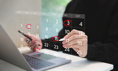 Calendar agenda appointment meeting schedule concept. Man using digital calendar on laptop to...