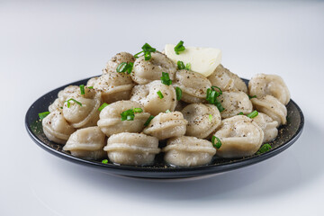 fresh boiled dumplings on a white background