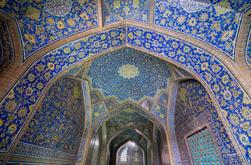 Sheikh Lotfollah Mosque, Isfahan, Iran - March 5, 2024: The mosque's intricate Islamic tiles showcase the grandeur of Safavid-era architecture.