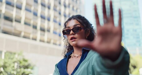 Girl, face and hand frame with sunglasses in urban city for fashion, selfie and trendy streetwear. Mexican, female person or model and portrait in town for pride in designer brand or luxury clothes