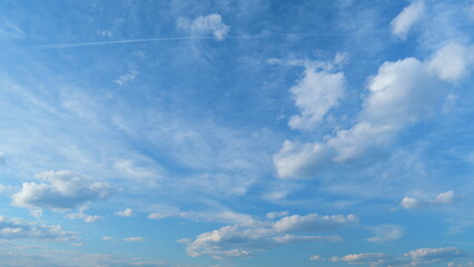 Clouds with blue light blue sky in horizon. No birds and free of defects. Cloudscape nature...