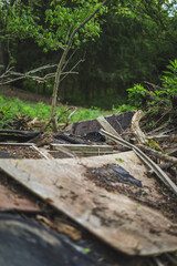 fallen down house in a field