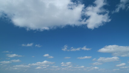 Sky after the storm. Majestic amazing blue sky with stratocumulus clouds. Nature cumulus clouds moving. Timelapse.