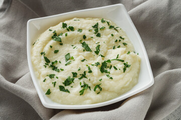 delicious mashed cauliflower on a white background