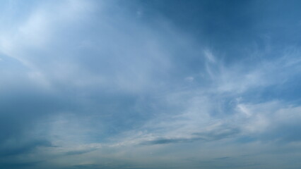 Moving clouds against a blue sky. Weather forecast, climate, atmospheric layer, nature. Timelapse.