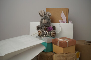 Boxes with gifts, set of boxes, toy baby rabbit.