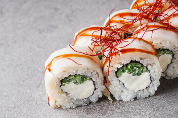 delicious fresh sushi roll philadelphia cheese with cucumber escolar