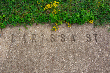 Street name carved into the concrete pavement in Jacksonville, Cherokee County, Texas
