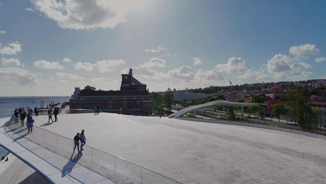 Flying over the giant engagement ring by Joana Vasconcelos and MAAT museum in Belem, in Lisbon, Portugal