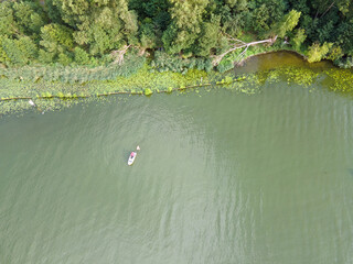 Aerial top down of river water near Grunewald forest on a sunny spring day in Berlin