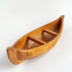 A small wooden boat floats on a white surface