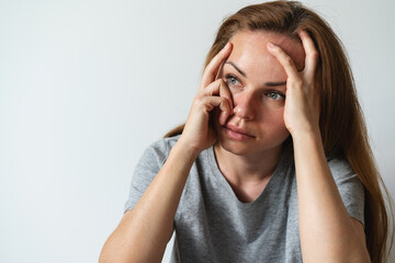 Lonely woman depressed at home. Mental illness, anxiety, worries.