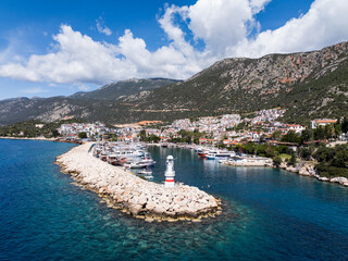 Scenic View of Kaş Marina in Antalya, Turkey - Coastal Town with Lighthouse, Boats, and...