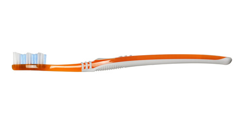 Orange new toothbrush isolated on white background with clipping path
