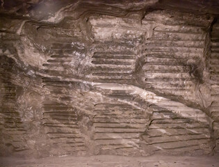 WIELICZKA, POLAND - JUNE 30: Interior view Wieliczka salt mine with textured salt walls ceiling