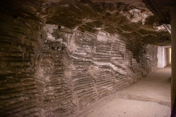 WIELICZKA, POLAND - JUNE 30: Interior view Wieliczka salt mine with textured salt walls ceiling