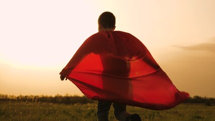 boy son child superhero game running park field sunset grass victory red cloak fancy dress, boy superhero costume, child red cape, kid sunset field, son playing hero, young masquerade outfit, little