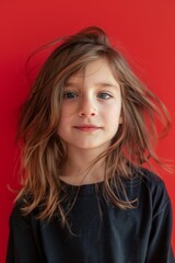 beautiful kid with solid color background. hair. lifestyle
