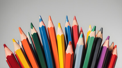 Fototapeta premium Multi-colored pencils on a white background